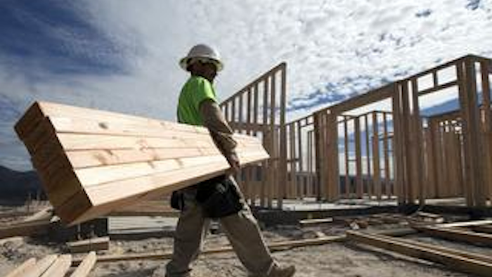 Mnet 43815 Construction Worker Miguel Fonseca Carries Lumber As He 0