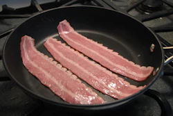 Mnet 171140 Turkey Bacon Cooking In Skillet