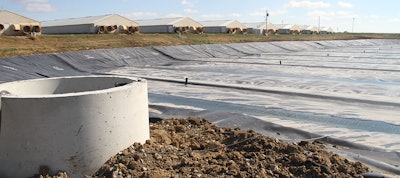 Provided by Roeslein Alternative Energy, a membrane is shown harvesting biogas at a hog farm. Once thought dead, allowing companies to buy and sell pollution 'rights' is part of talks at the Paris climate conference. (Roeslein Alternative Energy via AP)