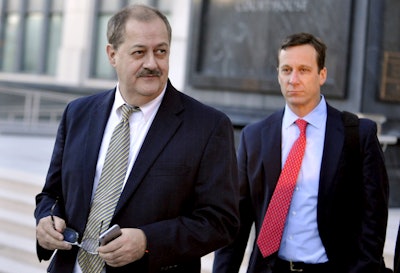 Shown here from earlier this year, former Massey Energy CEO Don Blankenship walks out of the Robert C. Byrd U.S. Courthouse. On Wednesday prosecutors opposed Blankenship’s plea to reduce his $5 million bond to $250,000 and drop travel restrictions. Blankenship was convicted December 3 of a misdemeanor conspiracy to willfully violate mine safety standards at Upper Big Branch. (AP Photo/Chris Tilley, File)