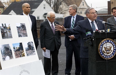 Booker, Menendez, Pascrell and Pallone announced reintroduction of legislation that would force industries responsible for contamination of Superfund sites to pay for their clean-up Monday, in Garfield, N.J. (AP Photo/Mel Evans)