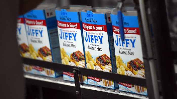 Jiffy baking mix boxes make their way through the plant on a conveyor belt on Tuesday, Dec. 8, 2015 in Chelsea, Mich. Chelsea Milling Company, the maker of Jiffy Mix, has begun a $35M expansion project at their downtown Chelsea location. (Melanie Maxwell/The Ann Arbor News via AP)