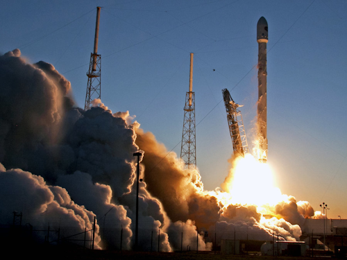 A Falcon 9 SpaceX rocket lifts off from launch complex 40 at the Cape Canaveral Air Force Station. (AP Photo/John Raoux)