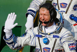 British astronaut Tim Peake, member of the main crew of the mission to the International Space Station (ISS), gestures, prior to the launch at the Russian leased Baikonur cosmodrome, Kazakhstan, Tuesday, Dec. 15, 2015. (AP Photo/Shamil Zhumatov, Pool)