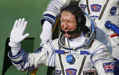 British astronaut Tim Peake, member of the main crew of the mission to the International Space Station (ISS), gestures, prior to the launch at the Russian leased Baikonur cosmodrome, Kazakhstan, Tuesday, Dec. 15, 2015. (AP Photo/Shamil Zhumatov, Pool)