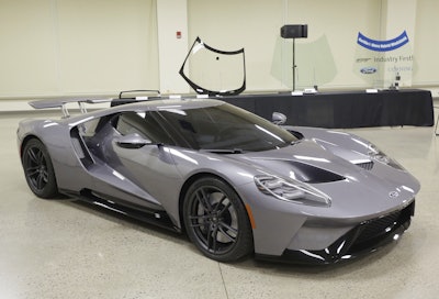 A Ford GT is displayed at the Dearborn Development Center in Dearborn, Mich. Ford Motor Co. will be the first to use Corning's Gorilla Glass for the vehicle's windshield which is scheduled to go on sale next year. The GT also has a Gorilla Glass engine cover. (AP Photo/Carlos Osorio)
