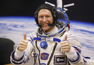 British astronaut Tim Peake, member of the main crew of the expedition to the International Space Station (ISS), gestures prior the launch in Kazakhstan. (AP Photo/Dmitry Lovetsky, File)