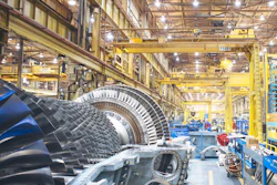 A gas turbine on the half shelf inside GE Power’s plant in Greenville, South Carolina (Image Credit: GE Power)