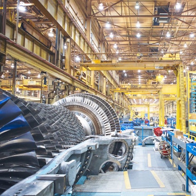 A gas turbine on the half shelf inside GE Power’s plant in Greenville, South Carolina (Image Credit: GE Power)