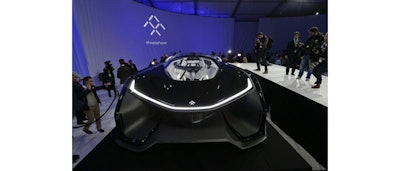 The FFZero1 by Faraday Future is displayed at CES Unveiled, a media preview event for CES International Monday, Jan. 4, 2016, in Las Vegas. The high performance electric concept car was unveiled during a news conference by Faraday Future. (AP Photo/Gregory Bull)