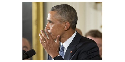 President Barack Obama begins to wipe away a tear as he speaks in the East Room of the White House in Washington, Tuesday, Jan. 5, 2016, about steps his administration is taking to reduce gun violence. Also on stage are stakeholders, and individuals whose lives have been impacted by the gun violence. (AP Photo/Pablo Martinez Monsivais)