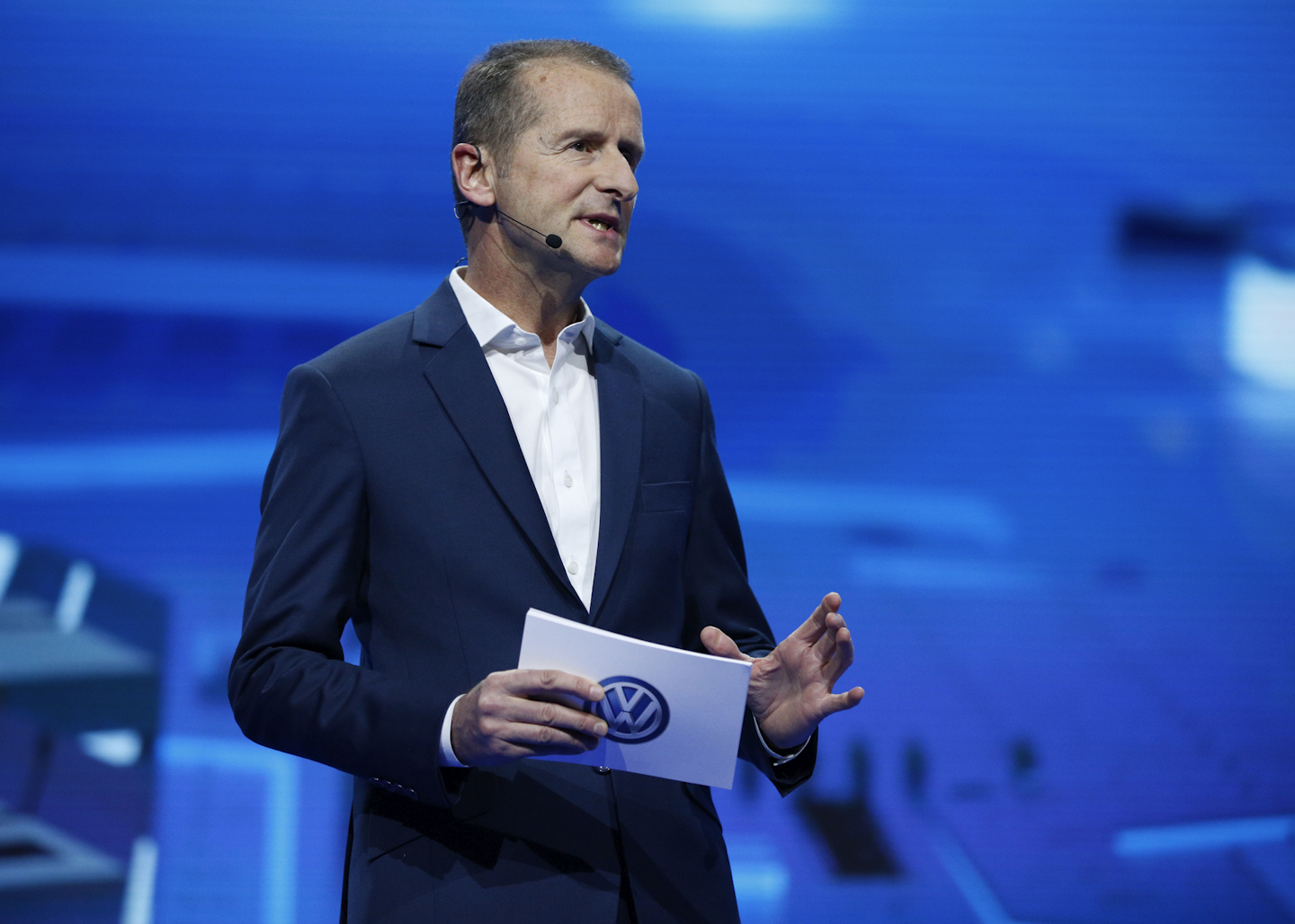 Herbert Diess, chairman of the board of Volkswagen Brand, speaks during a keynote address at CES International, Tuesday, Jan. 5, 2016, in Las Vegas. (AP Photo/John Locher)