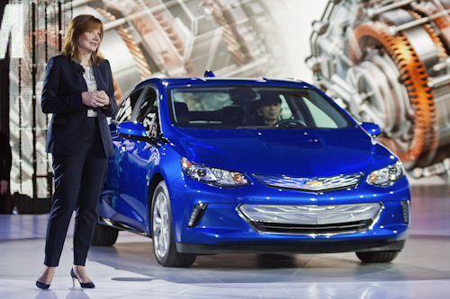 GM CEO and chairman appears with the Chevy Volt. (AP Photo)