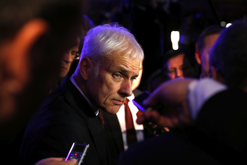 In his first US visit since American regulators said VW cheated pollution tests, Volkswagen AG CEO Matthias Mueller apologized over a scandal that plunged the German auto giant into the deepest crisis of its history and could cost billions in fines, recalls and class-action lawsuits. (AP Photo/Paul Sancya)