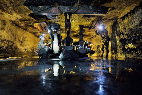 Workers secure the roof of a coal mine. (AP Photo/David Goldman)