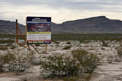 A sign advertising Mountain View Industrial Park near Apex Industrial Park, where Faraday plans to build its factory, in North Las Vegas. (AP Photo/John Locher, File)