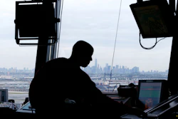 An air traffic controller works in the tower at Newark Liberty International Airport in Newark, N.J. (AP Photo/Julio Cortez, File)