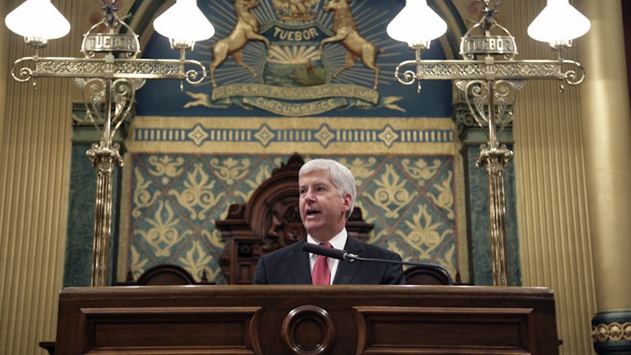 Michigan Gov. Rick Snyder delivers his State of the State address to a joint session of the House and Senate, Tuesday, Jan. 19, 2016, at the state Capitol in Lansing, Mich. (AP Photo/Al Goldis)