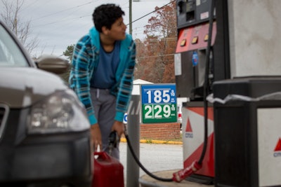 Cheaper gasoline and heating oil will give consumers worldwide more money to spend, or save and spend later, and possibly boost economic growth in the U.S., Europe and much of Asia. (AP Photo/Kevin Liles, File)