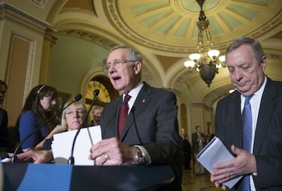Senate Minority Leader Harry Reid, D-Nevada, said Michigan's governor tried to 'save a few bucks with the water and, in the process, poisoned lots of people.' (AP Photo/J. Scott Applewhite)
