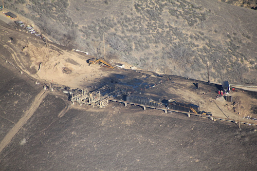 This Dec. 17, 2016 photo provided by Earthworks shows an overhead aerial view of the relief well at the Aliso Canyon facility above the Porter Ranch area of Los Angeles. (Pete Dronkers/Earthworks via AP)