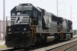 In this June 4, 2014 file photo, a Norfolk Southern locomotive moves along the tracks in Norfolk, Va. Three of the biggest freight railroads operating in the U.S. have told telling the government they won’t make a 2018 deadline to start using safety technology intended to prevent accidents like the deadly derailment of an Amtrak train in Philadelphia last May. Norfolk Southern, Canadian National Railway and CSX Transportation and say they won’t be ready until 2020, according to a list provided to The Associated Press by the Federal Railroad Administration. (AP Photo/Steve Helber, File)