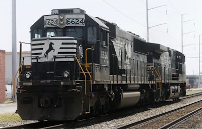 In this June 4, 2014 file photo, a Norfolk Southern locomotive moves along the tracks in Norfolk, Va. Three of the biggest freight railroads operating in the U.S. have told telling the government they won’t make a 2018 deadline to start using safety technology intended to prevent accidents like the deadly derailment of an Amtrak train in Philadelphia last May. Norfolk Southern, Canadian National Railway and CSX Transportation and say they won’t be ready until 2020, according to a list provided to The Associated Press by the Federal Railroad Administration. (AP Photo/Steve Helber, File)