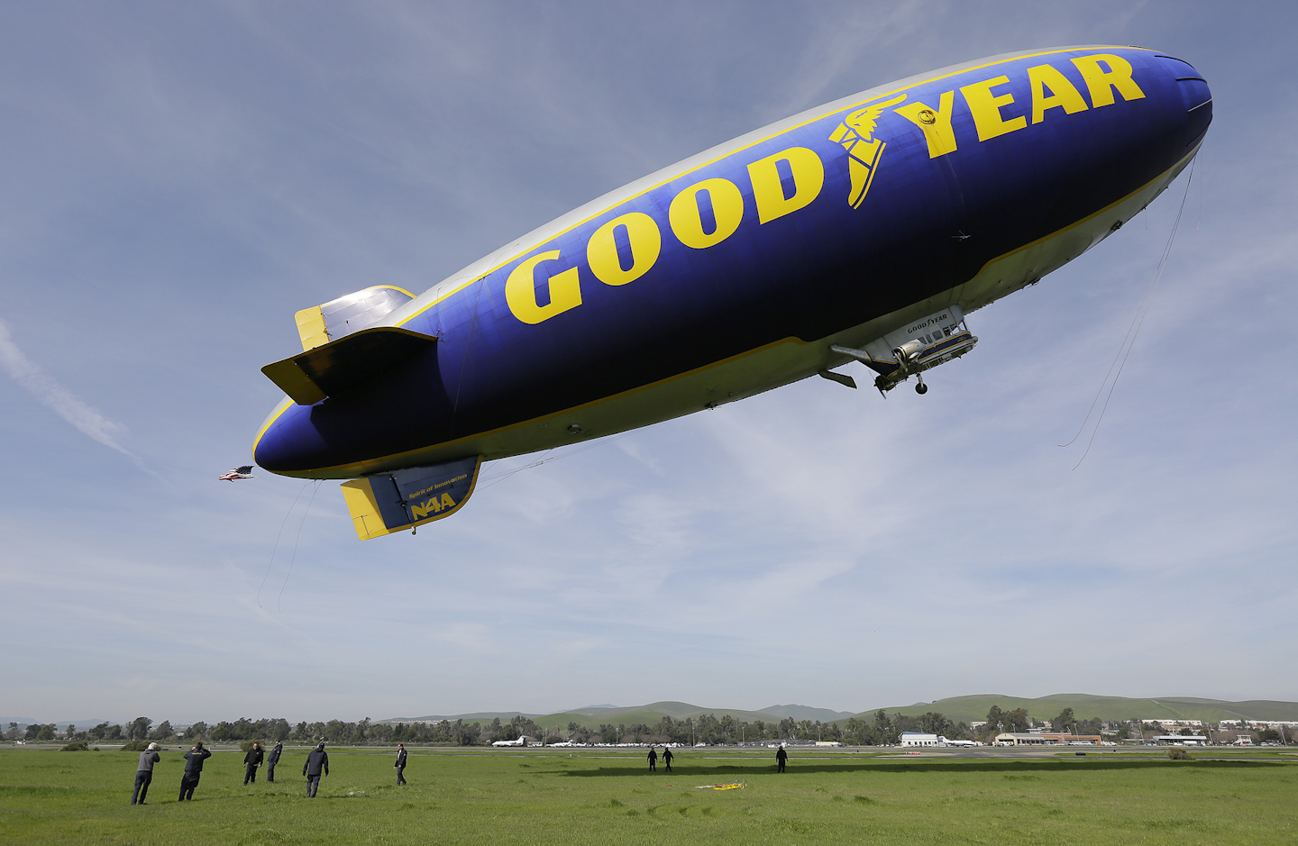 In this Friday, Feb. 5, 2016, file photo, the Goodyear Blimp Spirit of Innovation takes off for a flight over Super Bowl fan sites from the airport in Livermore, Calif. On Tuesday, Feb. 9, 2016, Goodyear Tire reports financial results. (AP Photo/Eric Risberg, File)