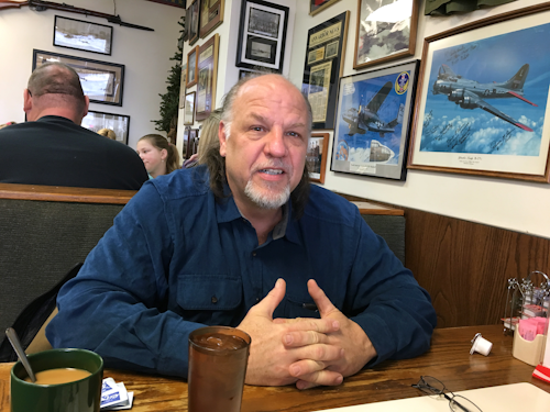 This photo provided by Adam Allington, taken Jan. 17, 2016, shows Earl Johnston in Yipsilanti, Mich. Johnston got his first job when he was 12- years-old, a paper route which he quickly expanded by 'buying out' additional routes from other, less industrious, boys. After high school, he enrolled in a program to become an industrial electrician. Increasing numbers of Americans are expecting to work well past the traditional retirement age, and in some cases they are dismissing the idea of retirement altogether. But health and a variety of other factors often get in the way of those expectations. (Adam Allington via AP)