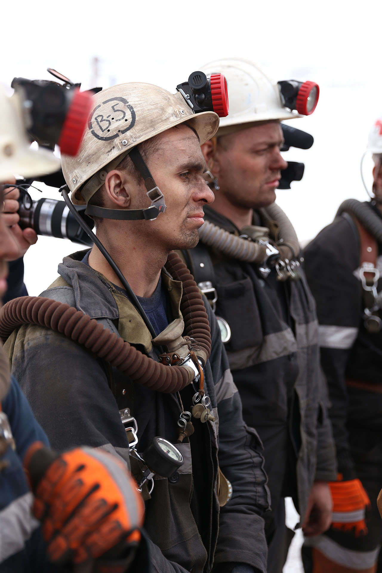 This Friday, Feb.26, 2016 photo provided by Russian Emergency Situations Ministry press service on Sunday, Feb. 28, 2016 shows rescuers listen to instruction in Vorkuta, Russia. Russian officials say a total of 36 people are believed to have died at a coal mine where a methane gas leak triggered three explosions and the collapse of the mine. The Russian emergency services say the dead include five rescue workers and a mine worker who were killed when the third explosion rocked the Vorkutaugol mine in Russia's far north Komi region early Sunday. (AP Photo/Ministry of Emergency Situations press service via AP)
