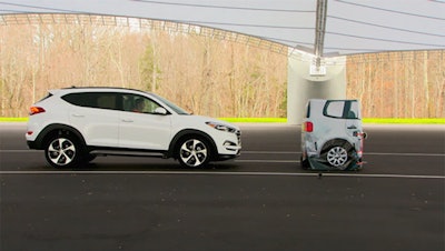A vehicle closes in on a Strikeable Surrogate Vehicle (SSV) at the IIHS Vehicle Research Center in Ruckersville, Va. (Insurance Institute for Highway Safety via AP)