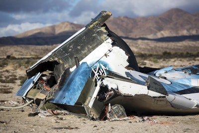 In this Nov. 1, 2014 file photo, wreckage lies near the site where a Virgin Galactic space tourism rocket, SpaceShipTwo, crashed in the desert near Mojave, Calif. (AP Photo/Ringo H.W. Chiu, File)