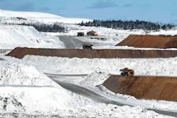 In this photo taken Feb. 9, 2016, the Hull-Rust Mahoning Mine, is seen from the overlook in Hibbing, Minn. The working mine is run by Hibbing Taconite Co. Several nearby mining operations have shut down amid the global slump in the steel industry. (AP Photo/Jim Mone)