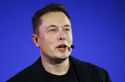 In this Wednesday, Dec. 2, 2015, file photo, Tesla Motors Inc. CEO Elon Musk delivers a conference at the Paris Pantheon Sorbonne University as part of the United Nations Climate Change Conference in Paris. Tesla Motors is set to unveil the Model 3, its first car in the $35,000 range. The Model 3 is the most serious test yet of 13-year-old Tesla’s ability to go from a niche player to a full-fledged automaker. (AP Photo/Francois Mori, File)