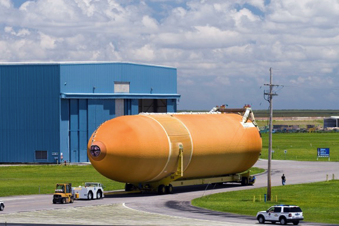 This undated photo provided by the California Science Center shows an External Fuel Tank built for the space shuttle sitting on a transporter, like the one that will take ET-94 across the city streets in Los Angeles and Inglewood, Calif. (NASA via AP)