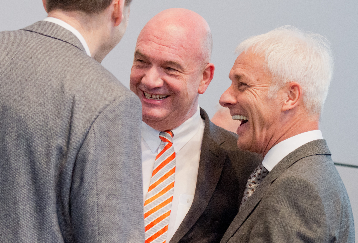 Bernd Osterloh, center, chairman of the Volkswagen general workers council, talks to Volkswagen AG CEO Matthias Mueller, right, during an employee meeting at the plant of the German car manufacturer in Wolfsburg, Germany, Tuesday March 8, 2016. (Julian Stratenschulte/dpa via AP)