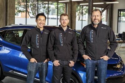 General Motors President Dan Ammann (right) with Cruise Automation co-founders Kyle Vogt (center) and Daniel Kan (left). (Image credit: GM)