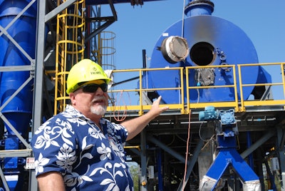Stan Osserman, director of the Hawaii Center for Advanced Transportation Technologies, speaks in front of a new waste to energy facility at Joint Base Pearl Harbor-Hickam, Hawaii. (AP Photo/Audrey McAvoy)