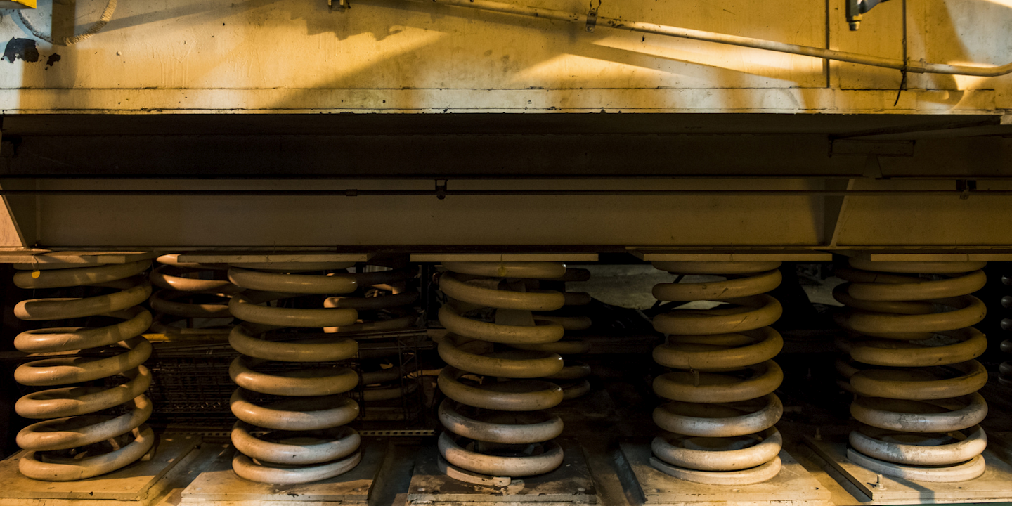 All of the complex's 15 buildings are built on springs.
