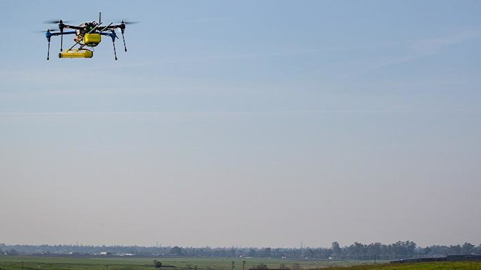 A mini methane gas sensor developed by NASA's Jet Propulsion Laboratory is shown attached to a drone during a flight test. The sensor detects methane with greater precision than other instruments used today. (Image credit: University of California, Merced)