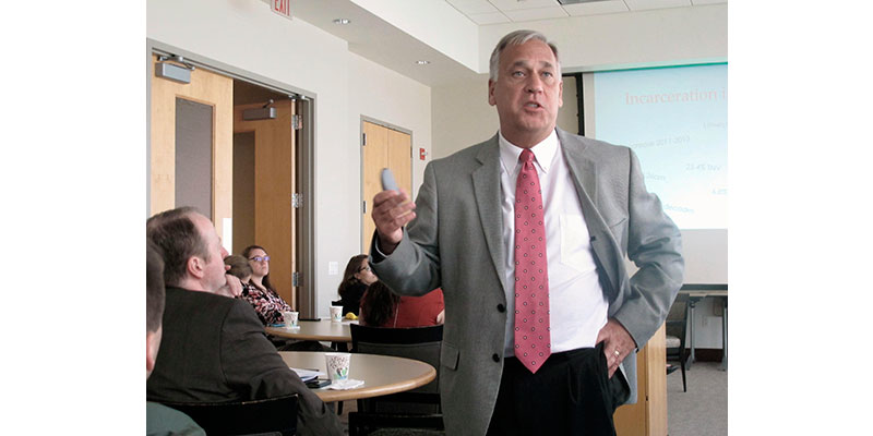 In this Aug. 13, 2015 file photo, Gary Mohr, director of the Ohio Department of Rehabilitation and Correction, speaks in Columbus, Ohio. Ohio's corrections department is shutting down its prison farms in a move to raise millions of dollars to fund new rehabilitation programs through land sales. Mohr says the state will continue operations this year but prepare to sell off livestock and stop farming by 2017