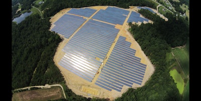 This Sept. 30, 2015 aerial photo provided by Cypress Creek Renewables, shows a commercial solar farm built on farmland by Cypress Creek Renewables in Catawba County, N.C. Less than a year after New York banned fracking, dashing the hopes of farmers who had hoped to reap royalties from natural gas leases, the commercial solar industry is courting landowners for energy production. Gov. Andrew Cuomo administration's initiatives aimed at promoting local renewable energy generation, reducing greenhouse gas emissions and generating 50 percent of the state's energy from renewable sources by 2030 are bringing solar developers to the state like Cypress Creek Renewable. (Cypress Creek Renewables via AP)