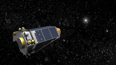 An undated artists concept provided by NASA shows the Keplar Spacecraft moving through space. (AP Photo/NASA)