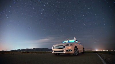 The autonomous Ford Fusion Hybrid shown here successfully drove itself at night recently without the use of headlights, radar sensors or camera sensors. (Image: Ford Motor Company)