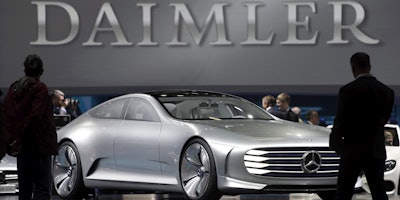 German car, truck and bus maker Daimler AG rebuffed questions about an internal investigation into its emissions certifications as news of the probe sent shares lower Friday, April 22. (AP Photo/Michael Sohn)