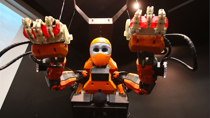 French officials show off 'Ocean One' an underwater diving robot at the history museum in Marseille, southern France. (AP Photo/Claude Paris)