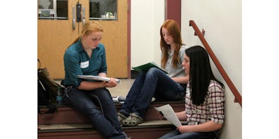 Members of a 4-H team from Duluth, Minn., prepare for their presentation at the University of Minnesota in St. Paul on how drones could protect livestock from predators. They are taking part in the 4-H Science of Agriculture Challenge, which aims to nurture the next generation of agricultural scientists for a country facing a critical shortage of them. (Allison Sandve/University of Minnesota Extension via AP)