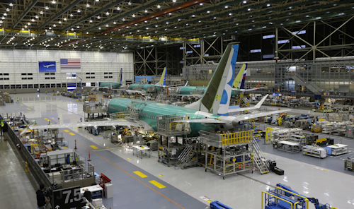 In this Monday, Dec. 7, 2015, file photo, the second Boeing 737 MAX airplane being built is shown on the assembly line in Renton, Wash. On Monday, May 2, 2016, the Institute for Supply Management, a trade group of purchasing managers, issues its index of manufacturing activity for April. (AP Photo/Ted S. Warren, File)