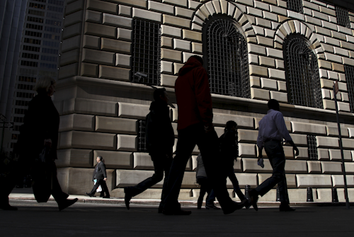 In this Thursday, Oct. 18, 2012, file photo, pedestrians walk past the Federal Reserve Bank of New York, in New York. On Monday, May 16, 2016, the Federal Reserve Bank of New York reports on factory activity in New York in May as indicated by its Empire State manufacturing index. (AP Photo/Seth Wenig, File)