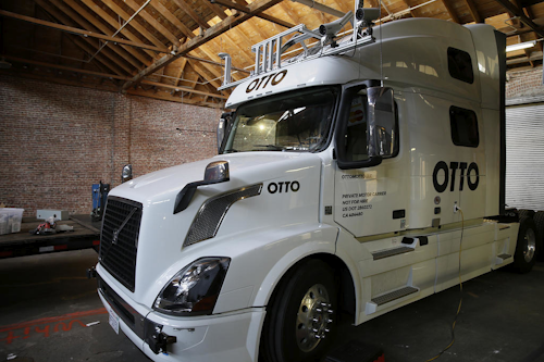 This Thursday, May 12, 2016, photo shows an Otto driverless truck at a garage in San Francisco. An 18-wheel truck barreling down the highway with 80,000 pounds of cargo and no one behind the wheel might seem reckless to most people, even in an age when a few driverless cars already are cruising some city streets. But robot-loving Anthony Levandowski is betting autonomous big rigs will be the next big thing on the road to creating a safer and saner transportation system. (AP Photo/Eric Risberg)